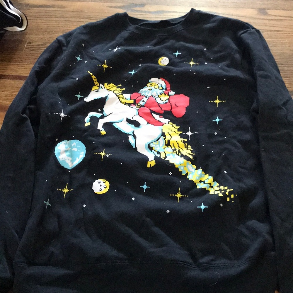 Santa riding unicorn in space sweatshirt. Small